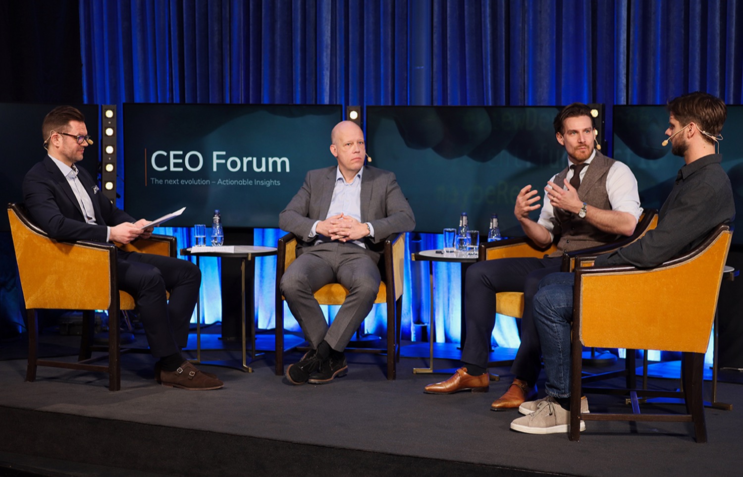 Johan Grönstedt on stage at a CEO Forum, in conversation with business leaders